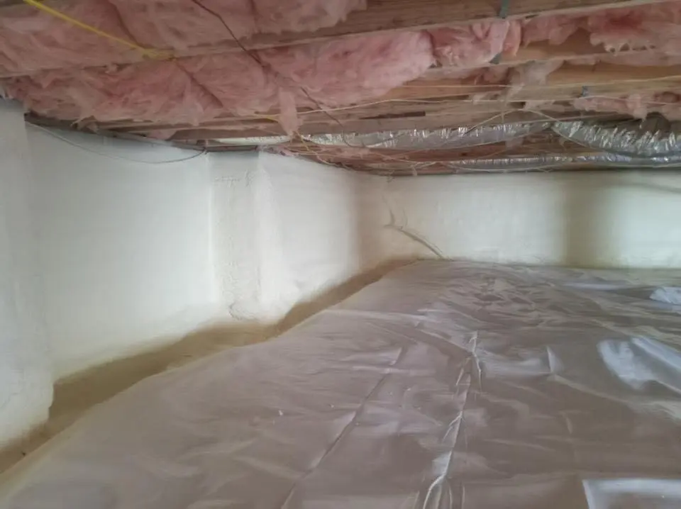 Crawl space encapsulation with closed-cell spray foam for Roof Waterproofing in Woodfin